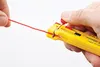 A close-up shot of a person's hands using a yellow wire stripper tool on a red wire. Produktbild-Vorschau