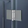 A close-up view of a shower hinge on a glass shower door. Produktbild-Vorschau