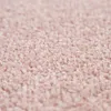 A close-up, shallow depth of field shot of a pink carpet. Produktbild-Vorschau