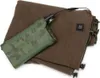 A folded brown heated blanket with a green camouflage power pack attached. Náhľad obrázku produktu