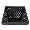 A black metal fire pit with a perforated pattern on the sides, shown from a high angle. Náhled obrázku produktu