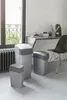 Three trash bins of different sizes are placed on a light gray floor in front of a window and a desk. Voir les images du produit