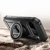 A black phone case with a ring holder is displayed on a rocky surface. Náhľad obrázku produktu