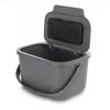 A gray compost bin with its lid open, shown against a white background. Voir les images du produit