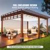 A wooden pergola with outdoor furniture and lighting, set in a garden. Anteprima dell’immagine prodotto