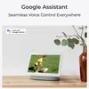 A smart display device showing a child playing with a dog on a grassy field, with a vase of eucalyptus leaves in the background. Náhľad obrázku produktu