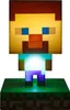 A Minecraft Steve Icon Light is displayed on a green, pixelated base. Produktbild-Vorschau