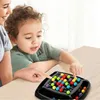 A child and an adult are playing a board game with colorful balls on a table. Produktbild-Vorschau