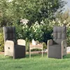Two outdoor chairs and a small table are set up on a green lawn in front of lush green bushes with white flowers. Produktbild-Vorschau