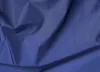 A close-up view of dark blue fabric with folds and creases. Produktbild-Vorschau