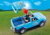 A toy pick-up truck with figures in a grassy outdoor setting. Produktbild-Vorschau