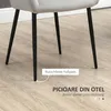 Close-up of the legs of a chair on a wooden floor, with text overlays highlighting features. Voir les images du produit