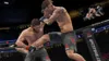 Two male MMA fighters in a ring, one kicking the other. Náhled obrázku produktu