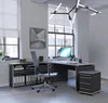 An office desk setup with a computer, chair, and storage units. Produktbild-Vorschau