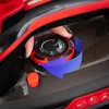 A close-up shot of a person's hand adjusting the temperature dial on a red and black iron. Anteprima dell’immagine prodotto