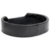 A black dog bed with a plush interior and faux leather exterior, shown from a slightly elevated side angle on a white background. Produktbild-Vorschau