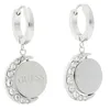 A pair of silver Guess earrings with moon-shaped pendants adorned with crystals. Produktbild-Vorschau