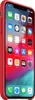 A red iPhone case is shown from a diagonal angle, displaying the phone's screen with various app icons. Anteprima dell’immagine prodotto