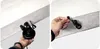 Close-up of a hand holding a black inflator device and a hand connecting a valve. Produktbild-Vorschau