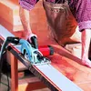 A person is using a circular saw to cut a piece of wood. Produktbild-Vorschau