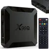 A black smart TV box and its remote control are displayed on a white background. Náhľad obrázku produktu