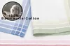 A close-up view of folded fabric handkerchiefs with different colored borders and patterns. Produktbild-Vorschau
