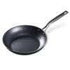 A black carbon steel frying pan with a gray handle is shown on a white background. Produktbild-Vorschau