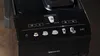 A close-up of the control panel of a black Siemens coffee machine. Produktbild-Vorschau