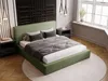 A bedroom scene featuring a green upholstered bed with bedding, bedside tables, and decorative elements. Produktbild-Vorschau