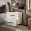 A modern bedroom setting with a nightstand. Produktbild-Vorschau