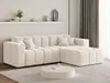 A modern cream sectional sofa is placed in a living room setting with a round coffee table in front of it. Produktbild-Vorschau