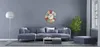 A living room scene with a sofa, coffee table, floor lamp, and a decorative clock on the wall. Anteprima dell’immagine prodotto