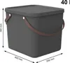 A dark gray storage bin with a brown handle and a lid, shown with dimensions indicated by measurement lines and text. Produktbild-Vorschau
