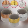 Three ceramic pots with metallic accents in copper, gold, and silver, displayed with close-up insets of each metallic finish. Podgląd zdjęcia produktu
