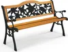 A garden bench with a wooden seat and backrest, and black metal legs and armrests with a floral design. Produktbild-Vorschau