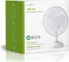 A cardboard box packaging for a white table fan. The box has green and white sections with product information and branding. Podgląd zdjęcia produktu
