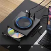 An external Blu-ray drive connected to a laptop on a desk. Produktbild-Vorschau