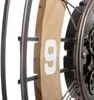 Close-up of a decorative clock mechanism with a wooden element and the number 9. Náhľad obrázku produktu