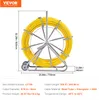 A yellow duct rodder on a metal stand with dimensions indicated. Náhled obrázku produktu