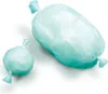 Two individually wrapped items, one larger and one smaller, both appearing to be some form of sanitary or waste product, presented on a white background. Produktbild-Vorschau