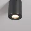 A close-up shot of a black cylindrical LED ceiling light. Produktbild-Vorschau