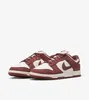 A pair of Nike Dunk Low Next Nature sneakers shown from a side-angle against a white background. Anteprima dell’immagine prodotto