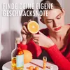 A woman is holding an orange slice, with a bottle of liquid, oranges, and small vials of ingredients on a table. Produktbild-Vorschau