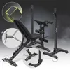 A black adjustable weight bench with a squat rack attachment, shown against a dark, smoky background. Multiple close-up insets highlight specific features of the bench. Náhľad obrázku produktu