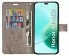 A flip cover wallet case for a smartphone, showing credit cards and a banknote inside. Produktbild-Vorschau