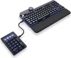 A black mechanical keyboard and a separate numpad are shown on a white background. Both devices have blue backlighting. Anteprima dell’immagine prodotto