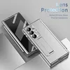 A silver-colored phone case with a built-in stand and pen holder is displayed on a reflective surface. Produktbild-Vorschau