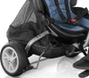 A close-up view of the lower section of a stroller, focusing on the wheel, seat, and storage basket. Produktbild-Vorschau