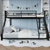 A child's bedroom with a black metal bunk bed, bedding, pillows, and toys on the floor. Podgląd zdjęcia produktu