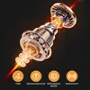 A cutaway view of a mechanical device, possibly a motor or engine, with glowing internal components and beams of light emanating from it. Below the device are four circular icons with text. Produktbild-Vorschau